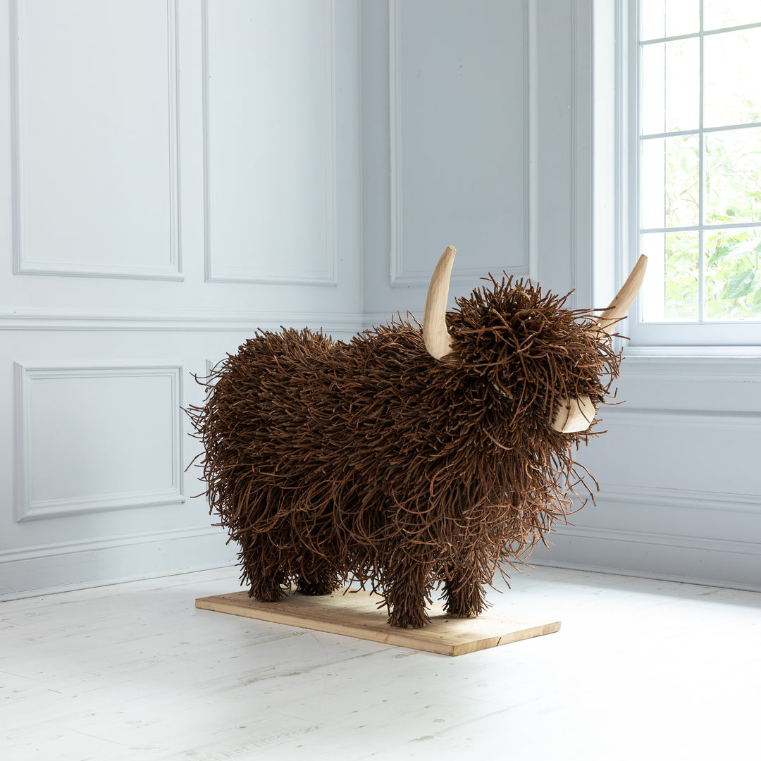 HOWARD WOODEN SCULPTURE