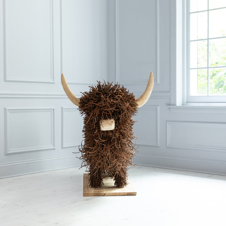 HOWARD WOODEN SCULPTURE