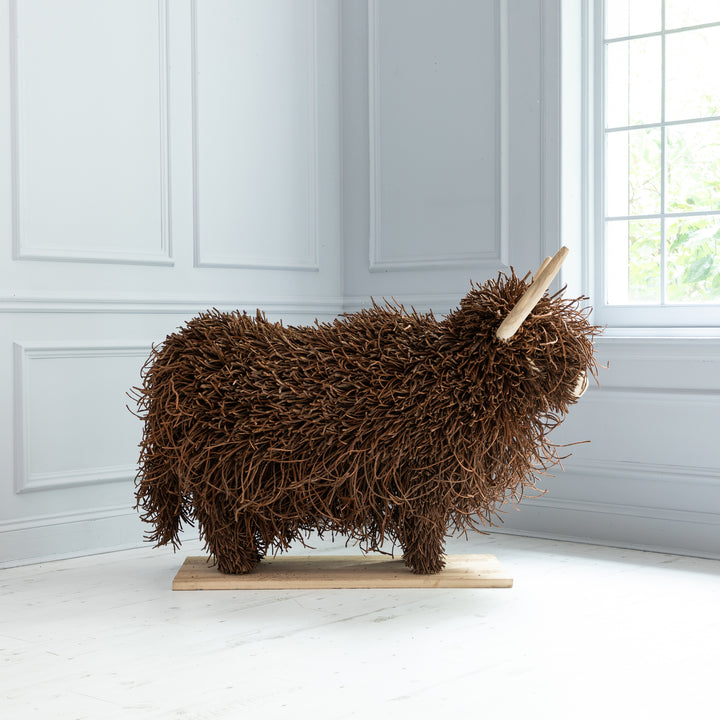 HOWARD WOODEN SCULPTURE
