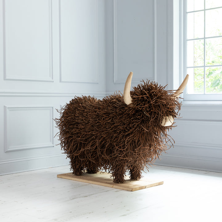 HOWARD WOODEN SCULPTURE