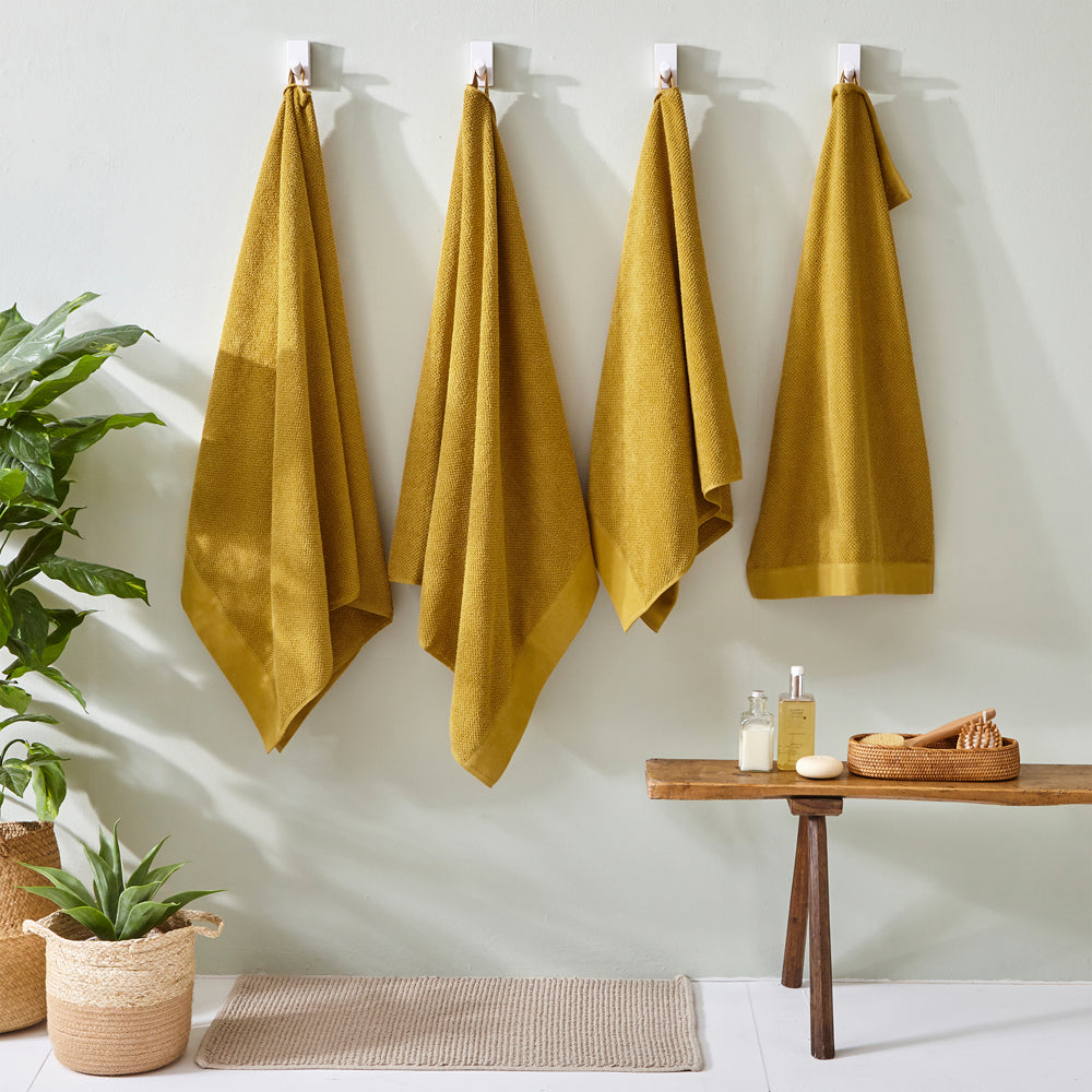 TEXTURED HAND TOWEL OCHRE