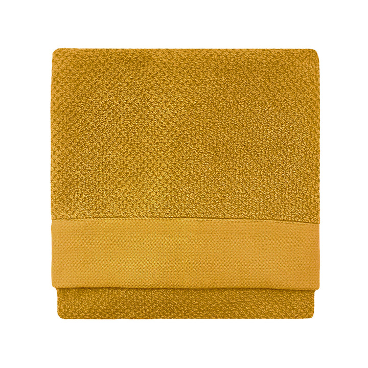 TEXTURED HAND TOWEL OCHRE