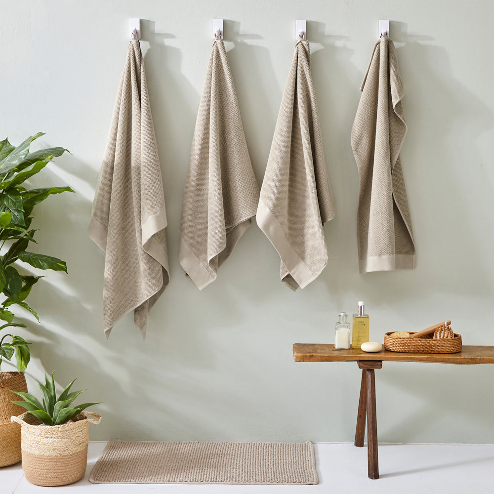 TEXTURED HAND TOWEL WARM NATURAL