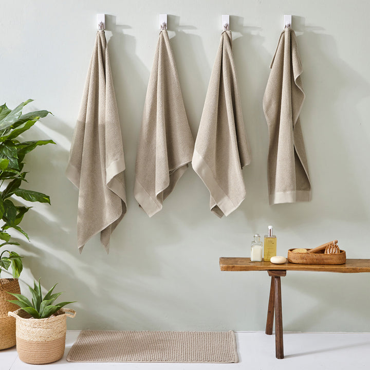 TEXTURED HAND TOWEL WARM NATURAL